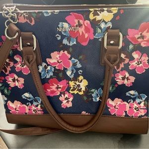 Floral handbag in good condition only one spot inside on the bottom of bag